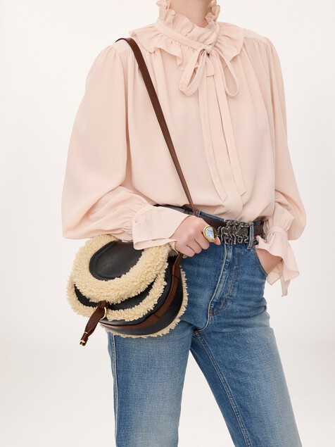 Small Marcie saddle bag in shearling & grained leather