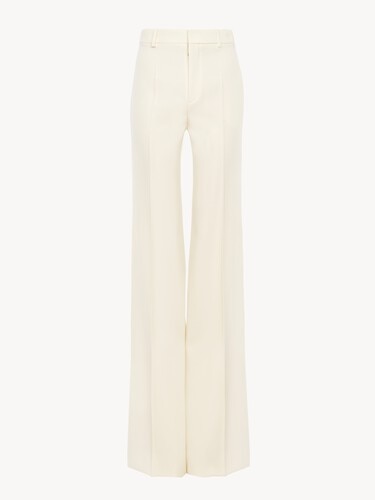 High-rise flared pants in wool grain de poudre - 1