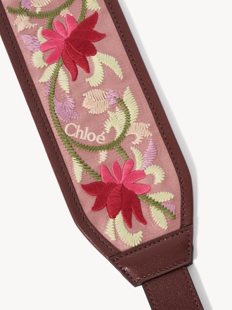 Grained leather strap with floral embroidery