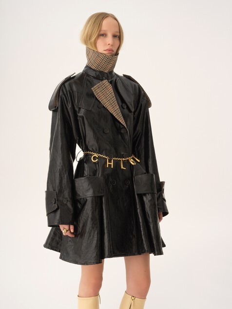 Double-breasted short riding coat in coated linen