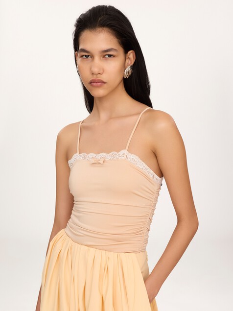 Lace-trimmed ruched bodysuit