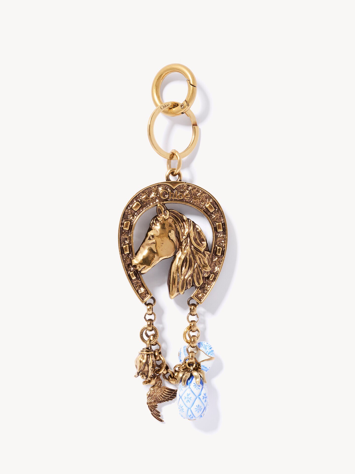 Chlo&eacute; Symbols Horseshoe & Jewels key ring bag charm in brass - 1.0
