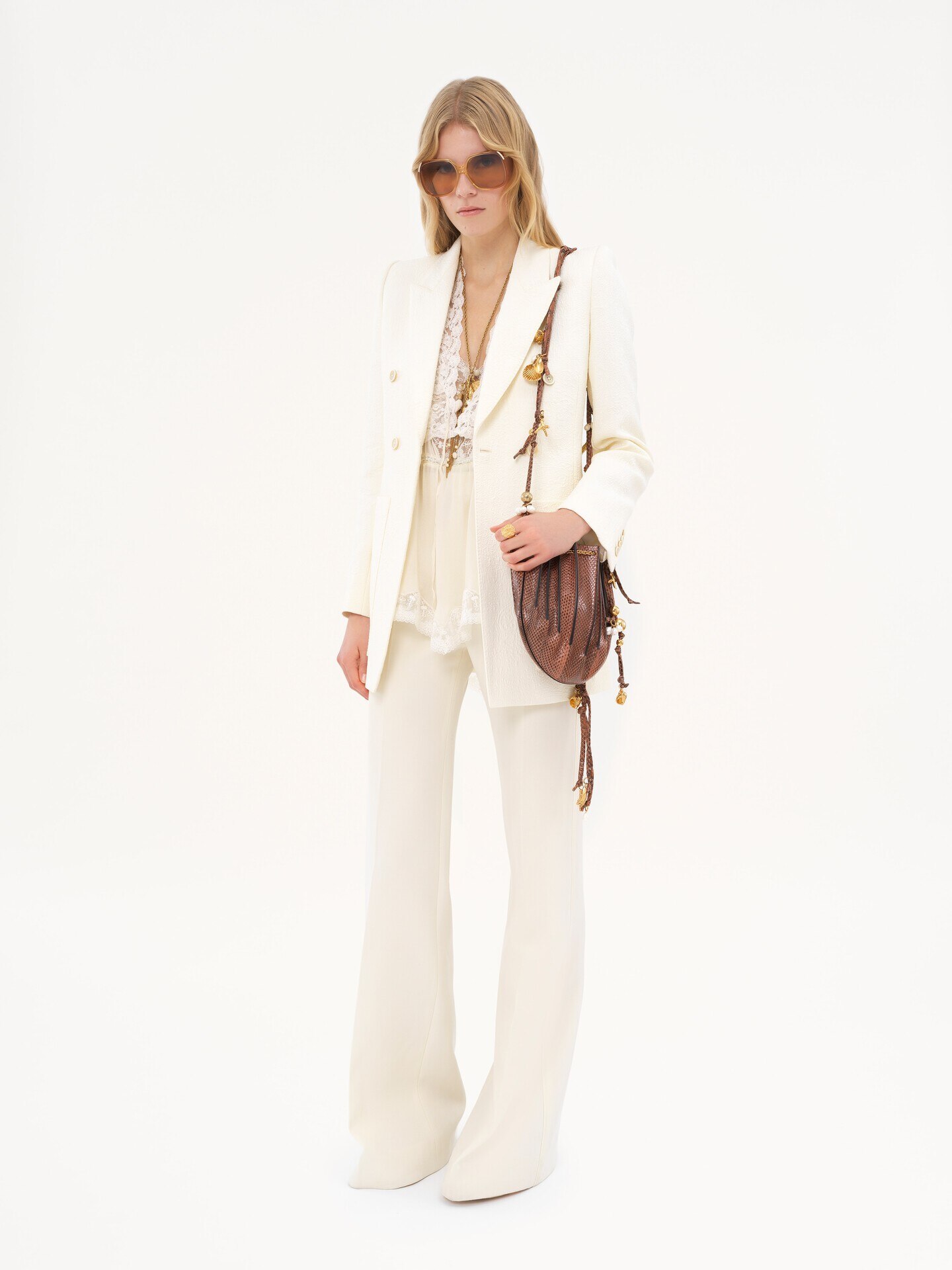 High-rise flared pants in wool grain de poudre - 1.0
