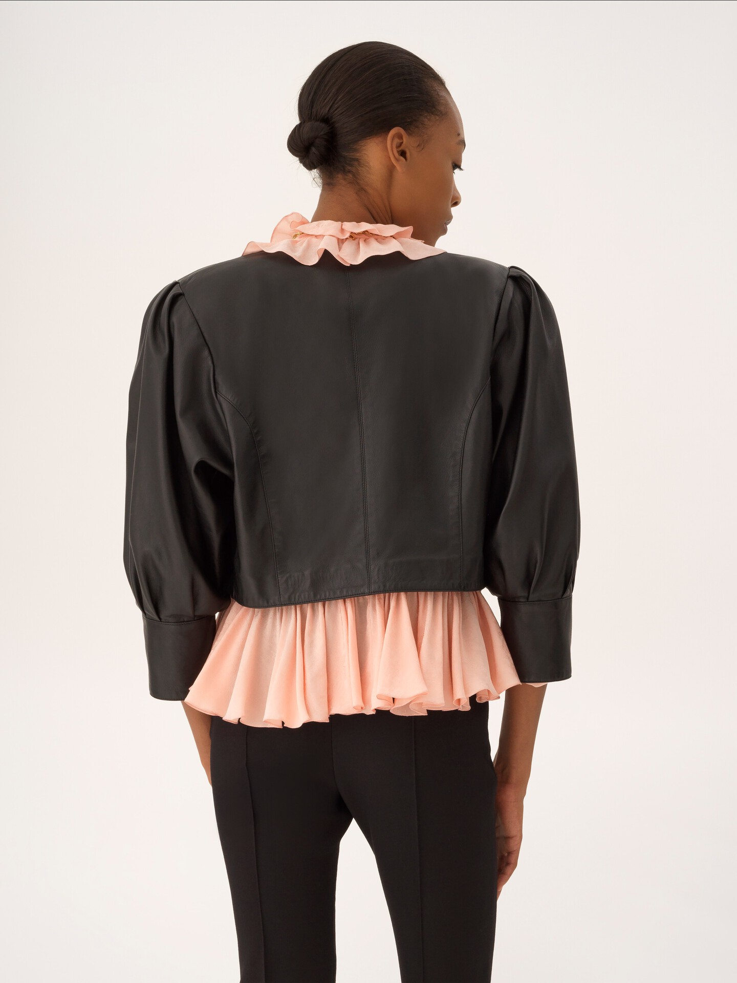 Cropped collarless jacket in leather - 5.0