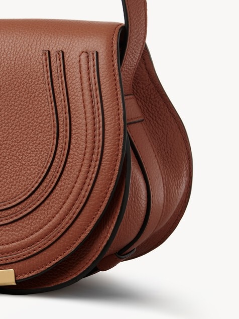 Small Marcie saddle bag in grained leather
