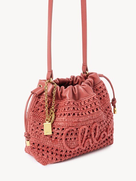Mini Summer Banana drawstring shoulder bag in raffia