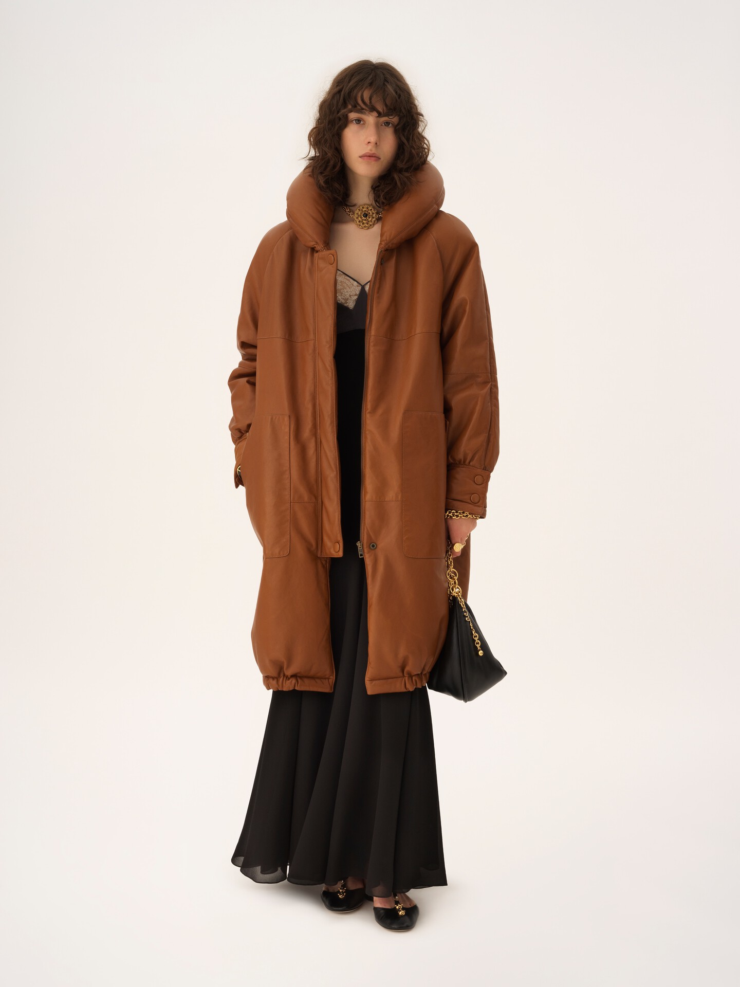 Long puffer coat in leather - 1.0