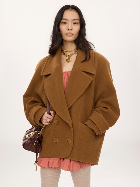 Double-breasted short coat in herringbone wool