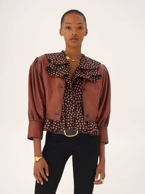 Cropped collarless jacket in leather
