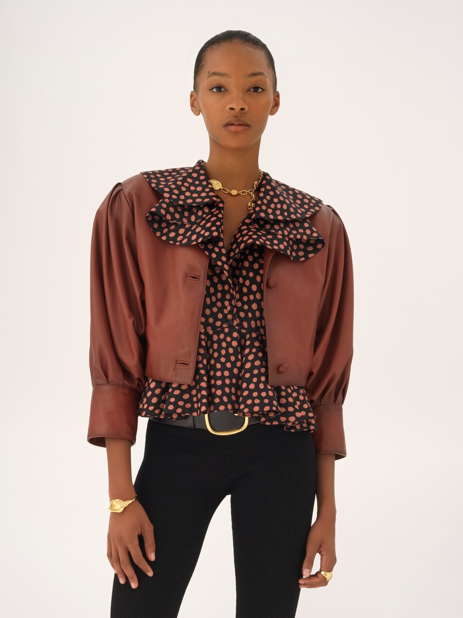 Cropped collarless jacket in leather