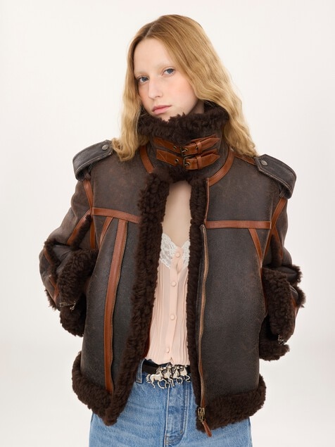High-neck jacket in shearling