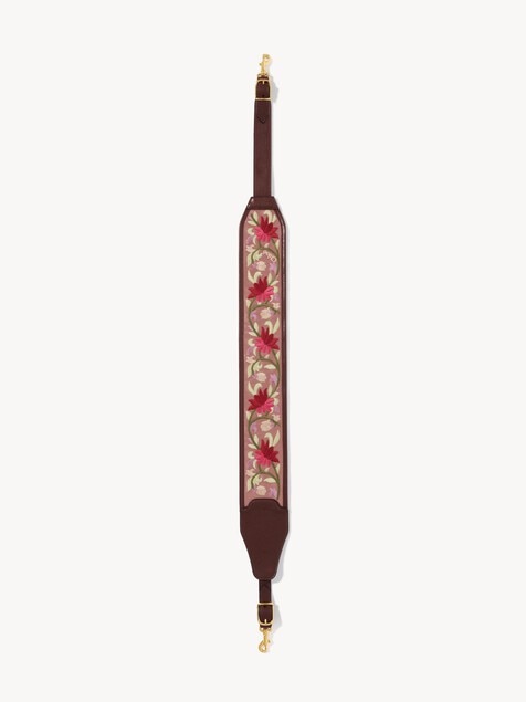 Bandouli&egrave;re en cuir grain&eacute; &agrave; broderies florales