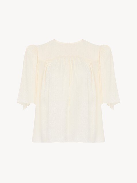 Top col rond fronc&eacute; en soie jacquard