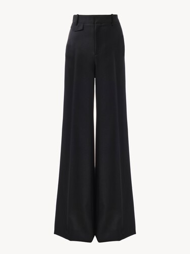 High-rise flared pants in wool grain de poudre - 1