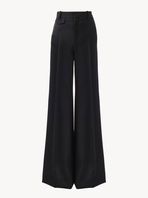 High-rise flared pants in wool grain de poudre