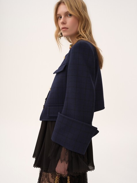 Boxy collarless jacket in wool check