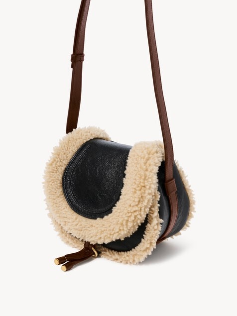 Small Marcie saddle bag in shearling & grained leather