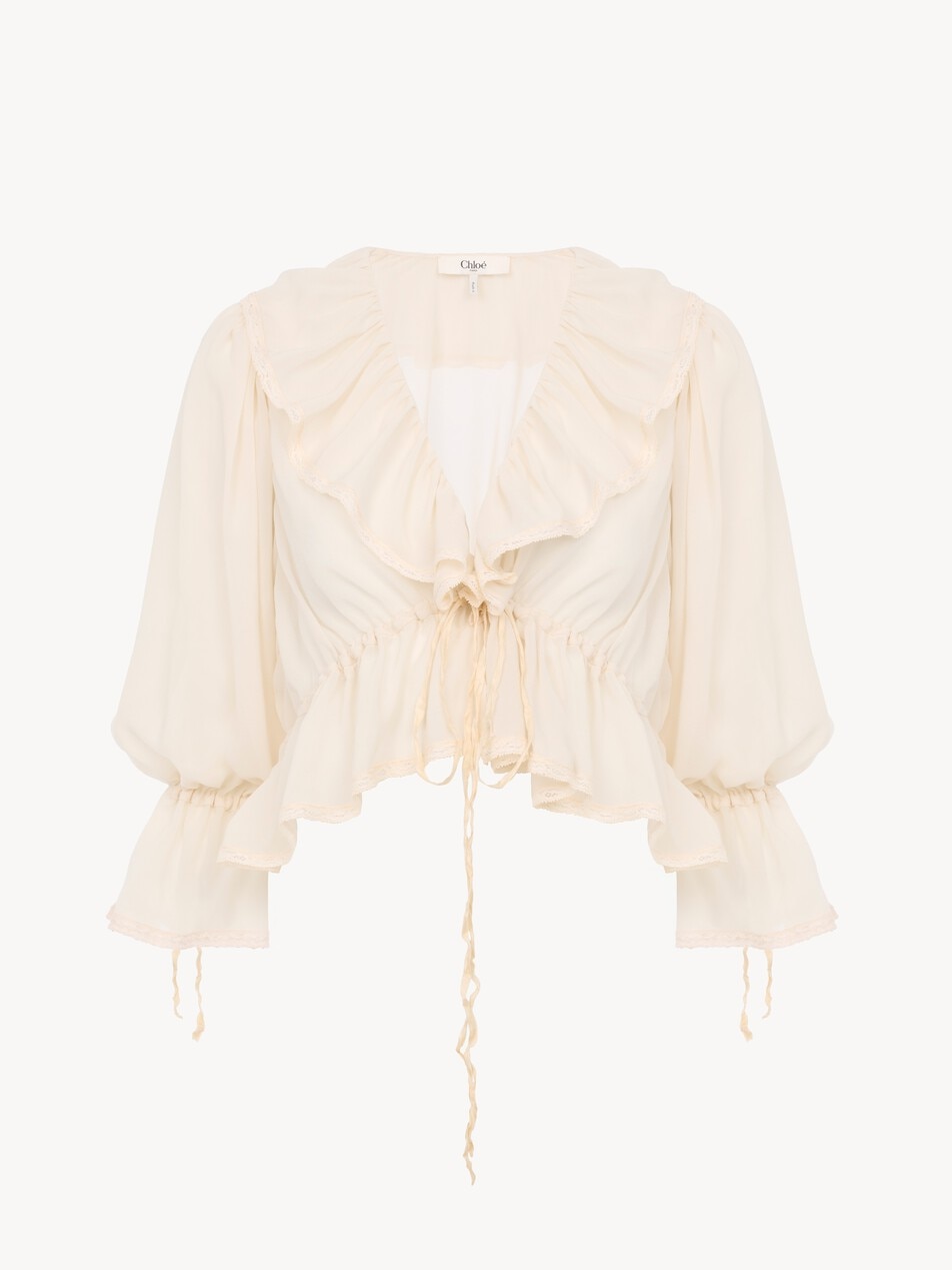 Cropped V-neck ruffle top in silk georgette & lace - Packshot