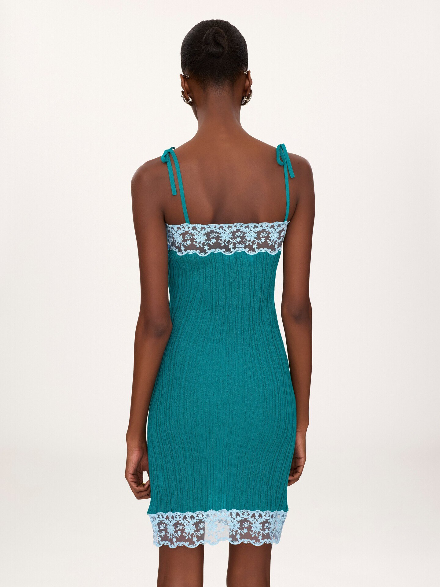Sleeveless fitted mini dress in a wool knit & lace - 5.0