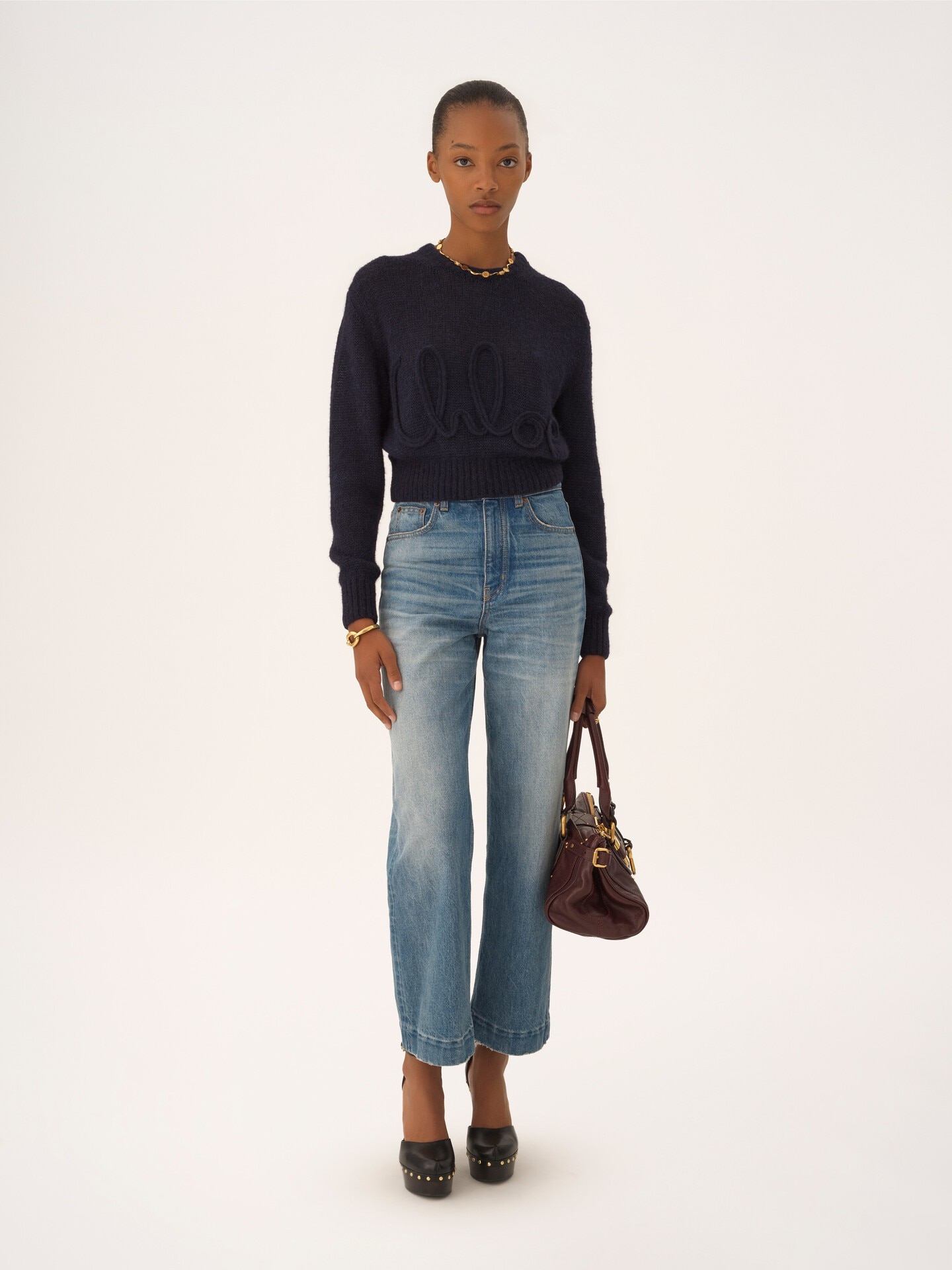 High-rise cropped jeans in denim - 1.0
