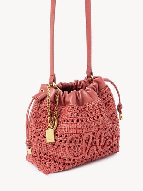 Mini Summer Banana drawstring shoulder bag in raffia